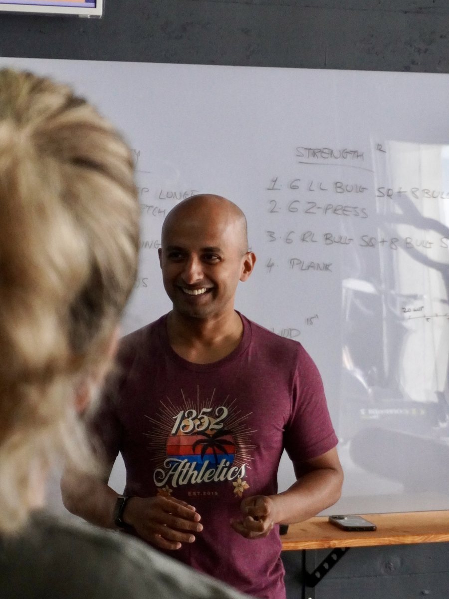 Coach explaining the workout at the whiteboard
